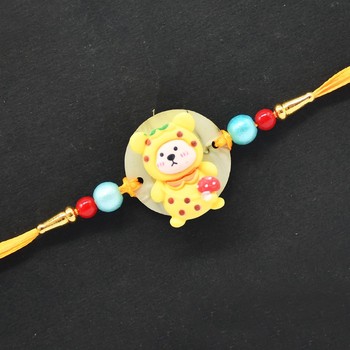 Toy Rakhi for Kids with Teddy Bear Toy, Chocolate Box and Roli Chawal Chopra Toy Rakhi for Kids with Teddy Bear Toy, Chocolate Box and Roli Chawal Chopra